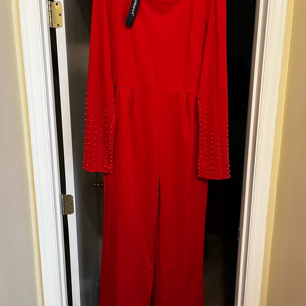 Red jumpsuit with matching belt with bling buckle
